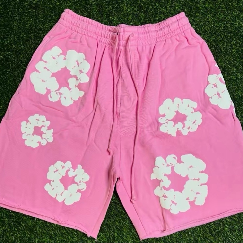 Pink denim tear shorts